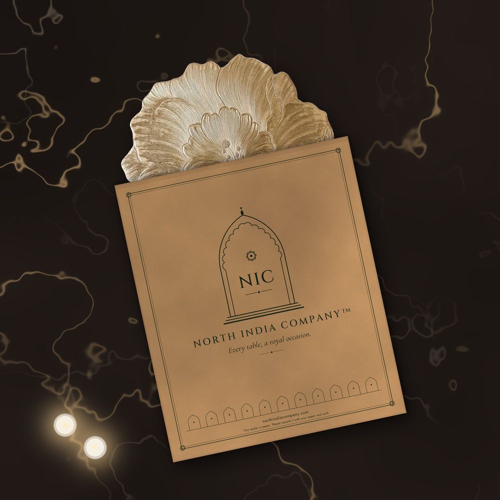 Zari Bloom placemat sliding out of a North India Company kraft paper mailer